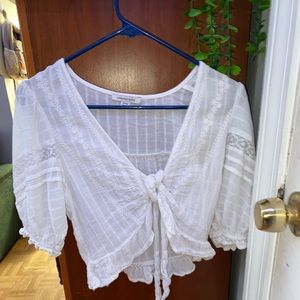 white American Eagle tie blouse